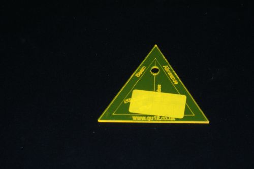 A 2 inch height ACRYLIC EQUAL TRIANGLE TEMPLATE