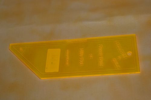 AN ACRYLIC FRENCH BRAID OR MITRE TEMPLATE